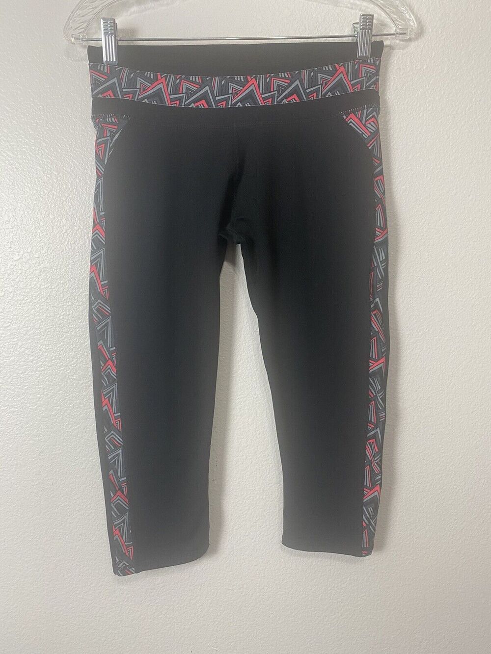 FABLETICS Women's Size SMALL Black Asymmetrical Grey Pink Pattern Capri Leggings
